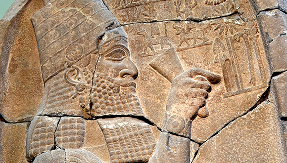 Esarhaddon, detail from his Victory Stele, c. 671 BCE. Basalt. Pergamon Museum, Berlin.